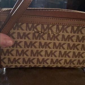 NWT Michael Kors “MK” wristlet. Brand new!